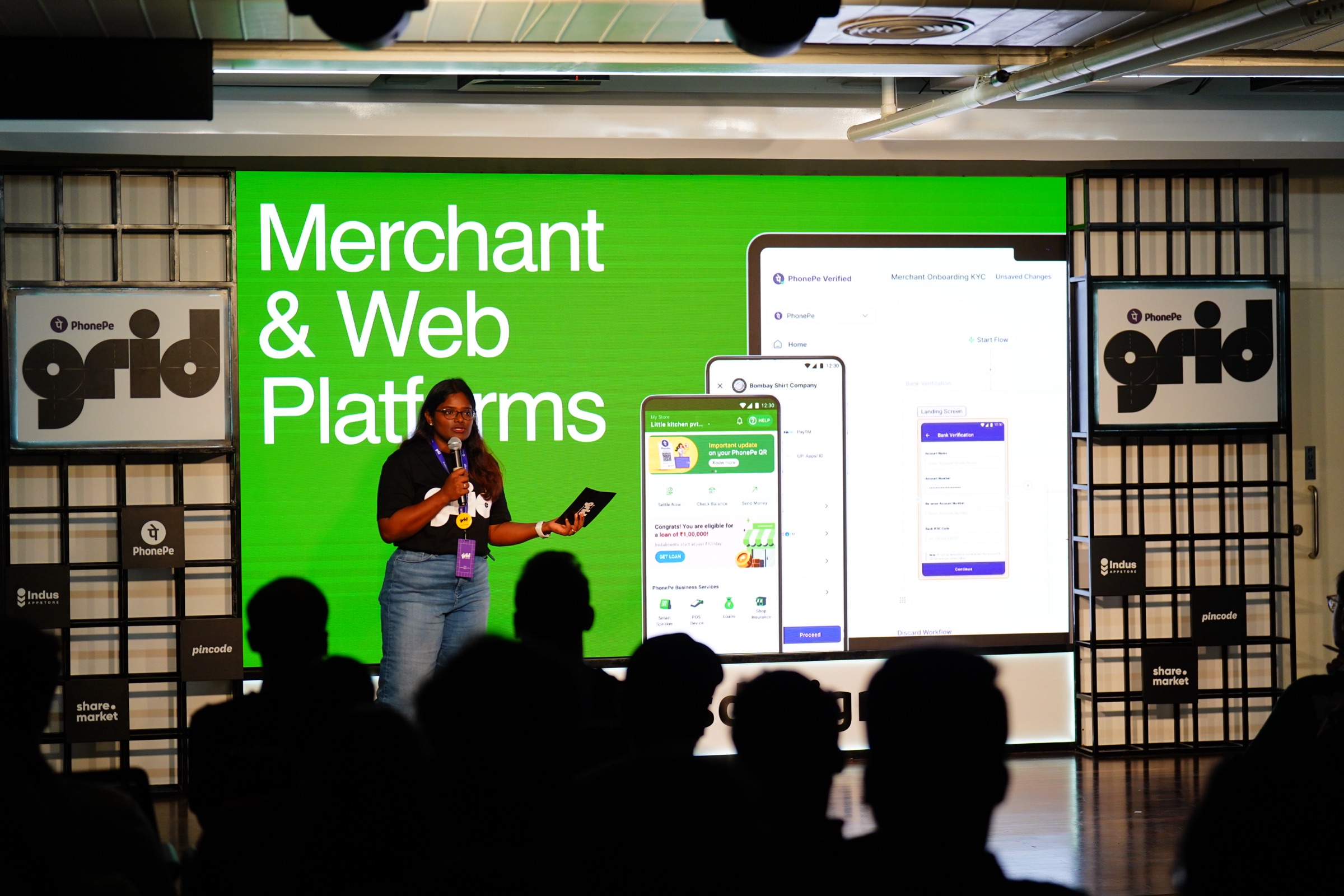 Surabhi Manchalwar presenting the Merchant & Web Platforms charter on stage at PhonePe Grid.